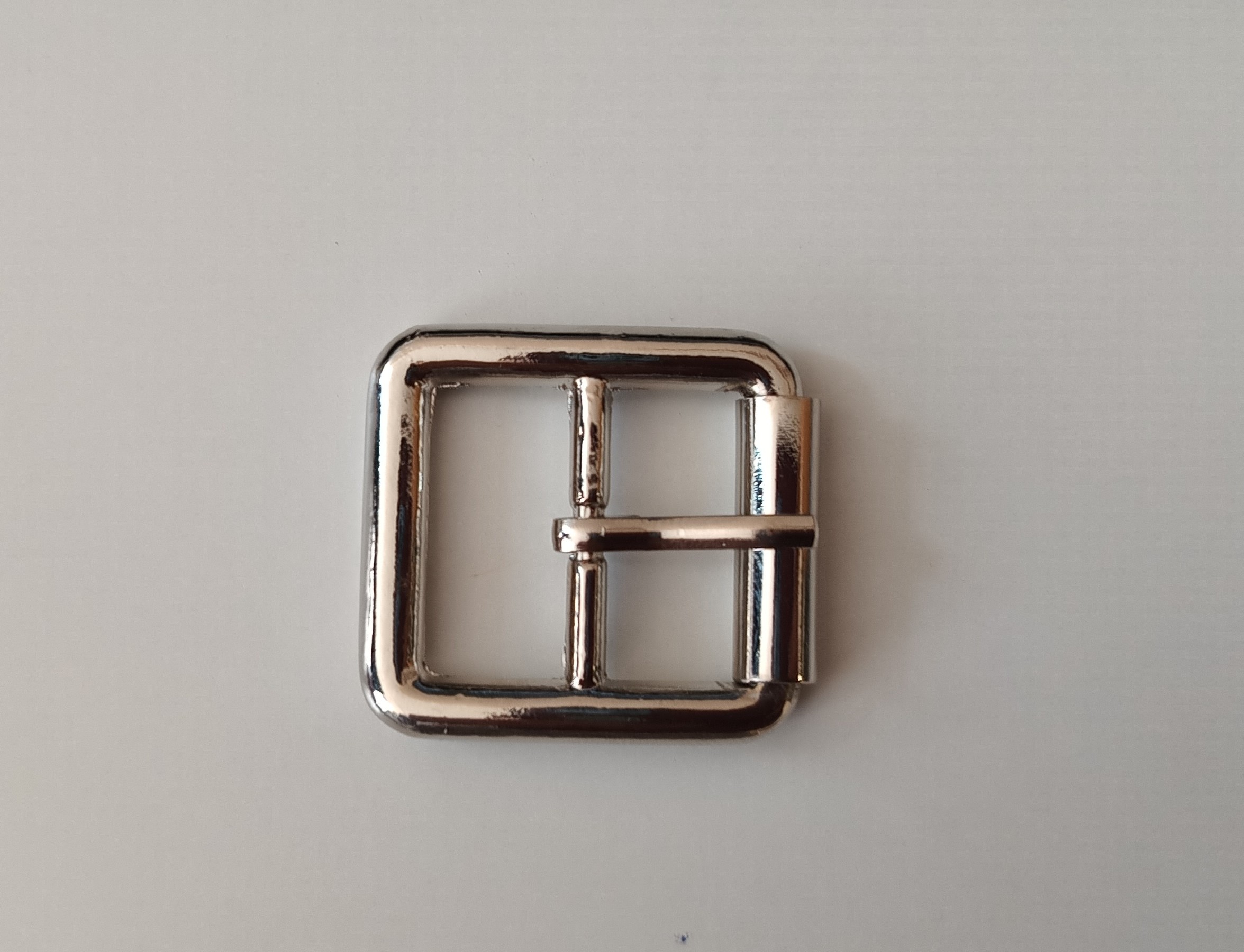 21.Obuvnícka pracka 25x20mm nikel